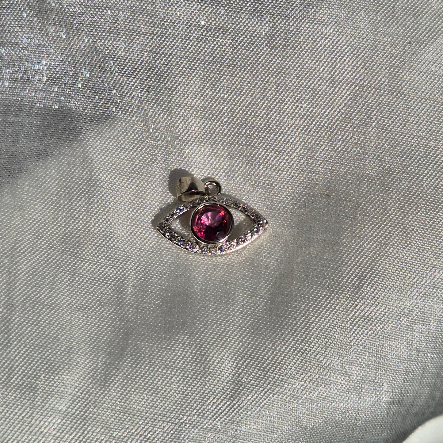 Pink topaz evil eye necklace