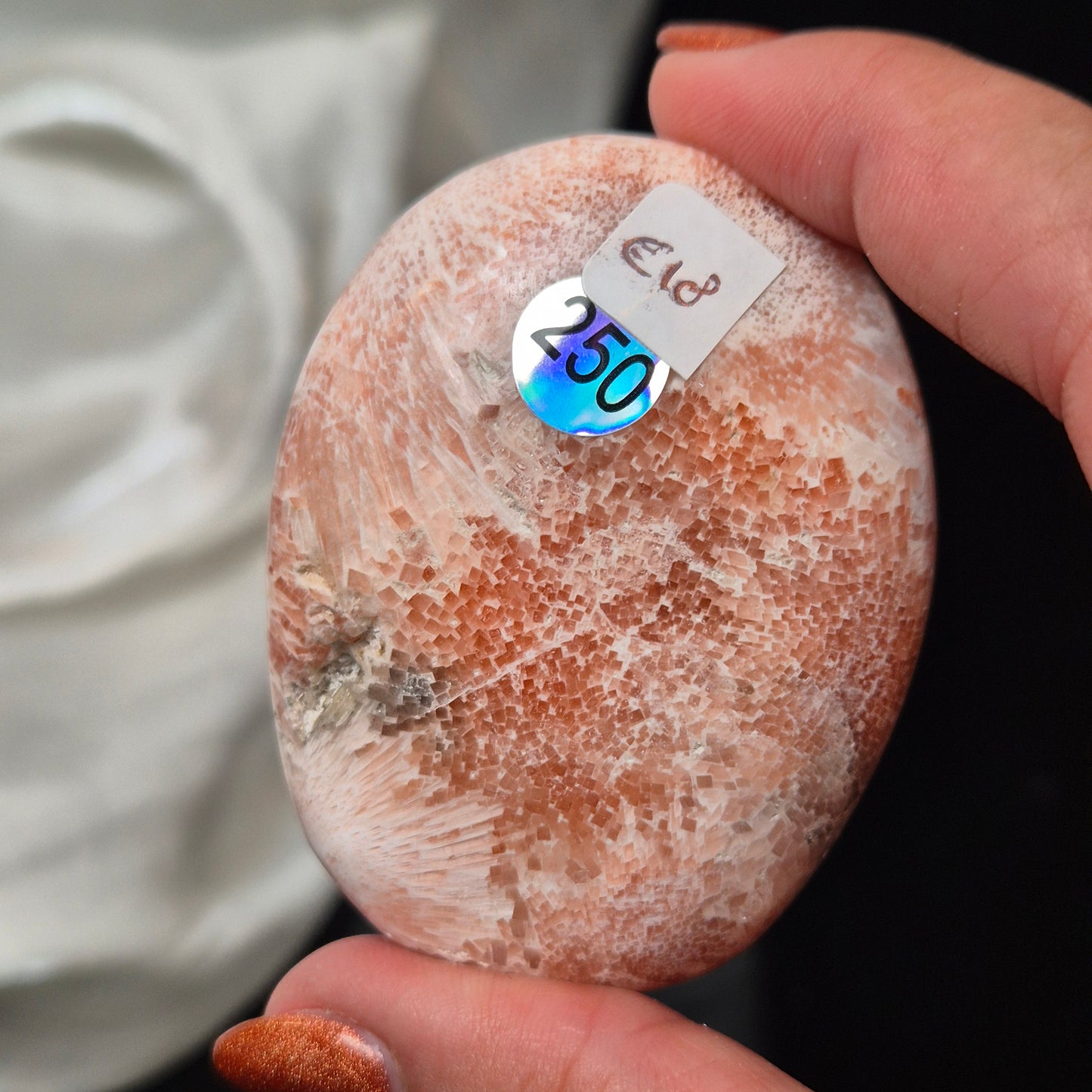 Pink scolecite palmstone 250