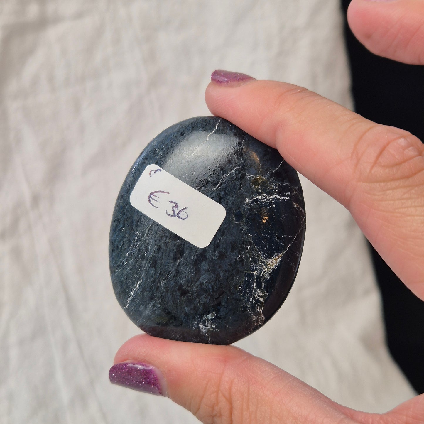 Rhodusite palmstone 8