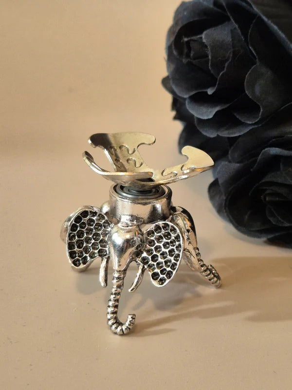 Spinning sphere stand elephant silver