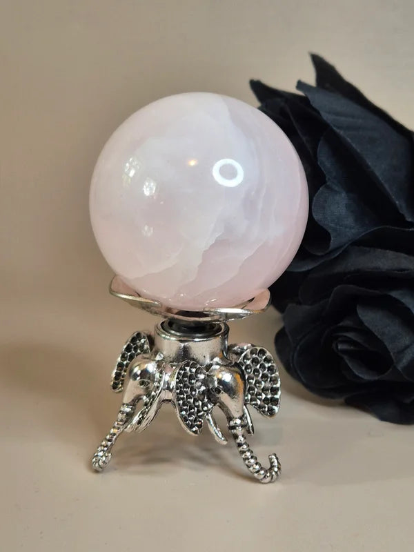 Spinning sphere stand elephant silver