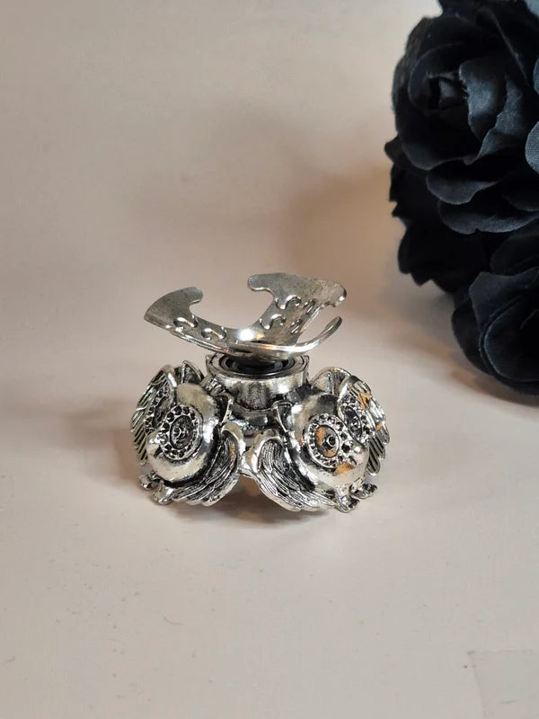 Spinning sphere stand owl silver
