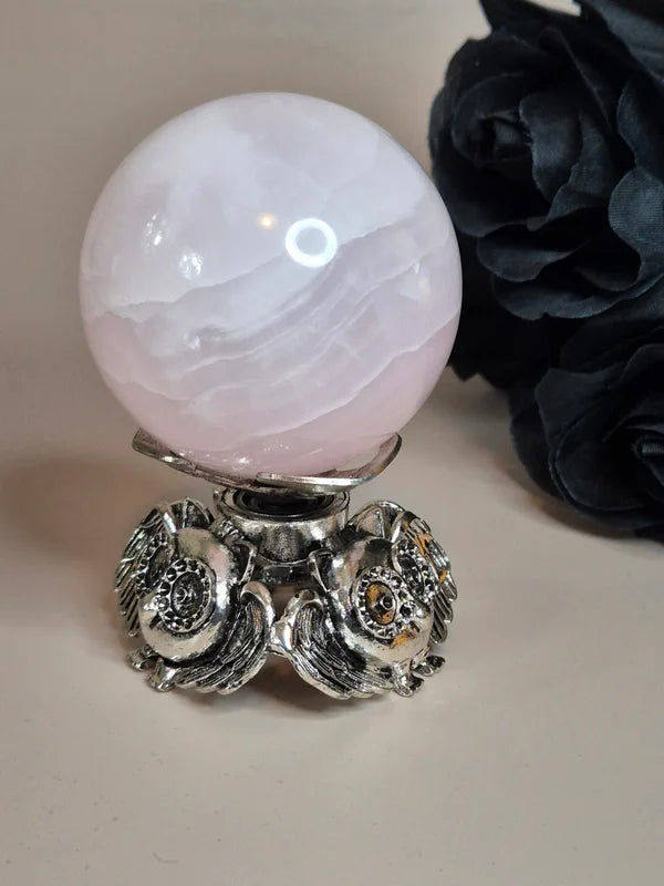 Spinning sphere stand owl silver
