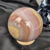 Pink "jelly" agate sphere 3