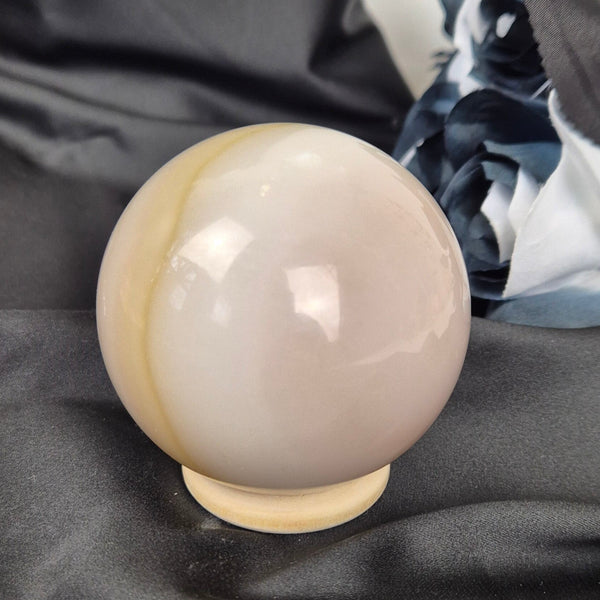 Pink "jelly" agate sphere 1
