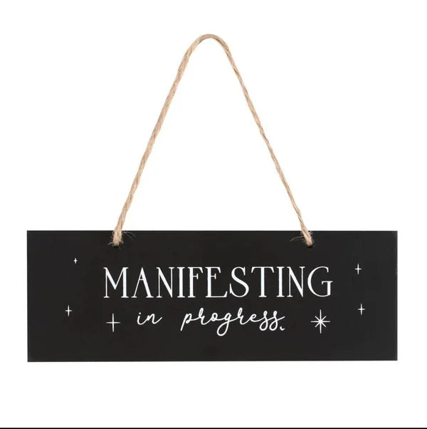 Wooden sign manifesting