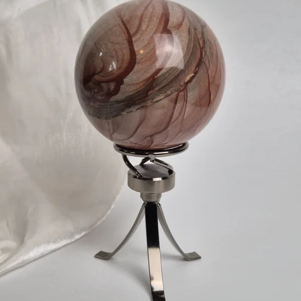 Spinning sphere stand silver