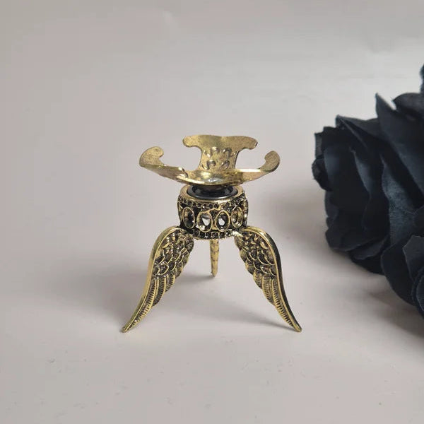 Spinning sphere stand wings gold