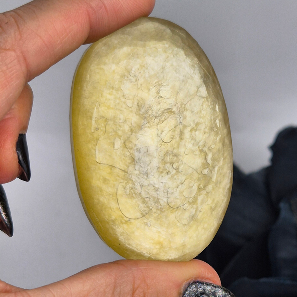 Yellow mica palmstone 11