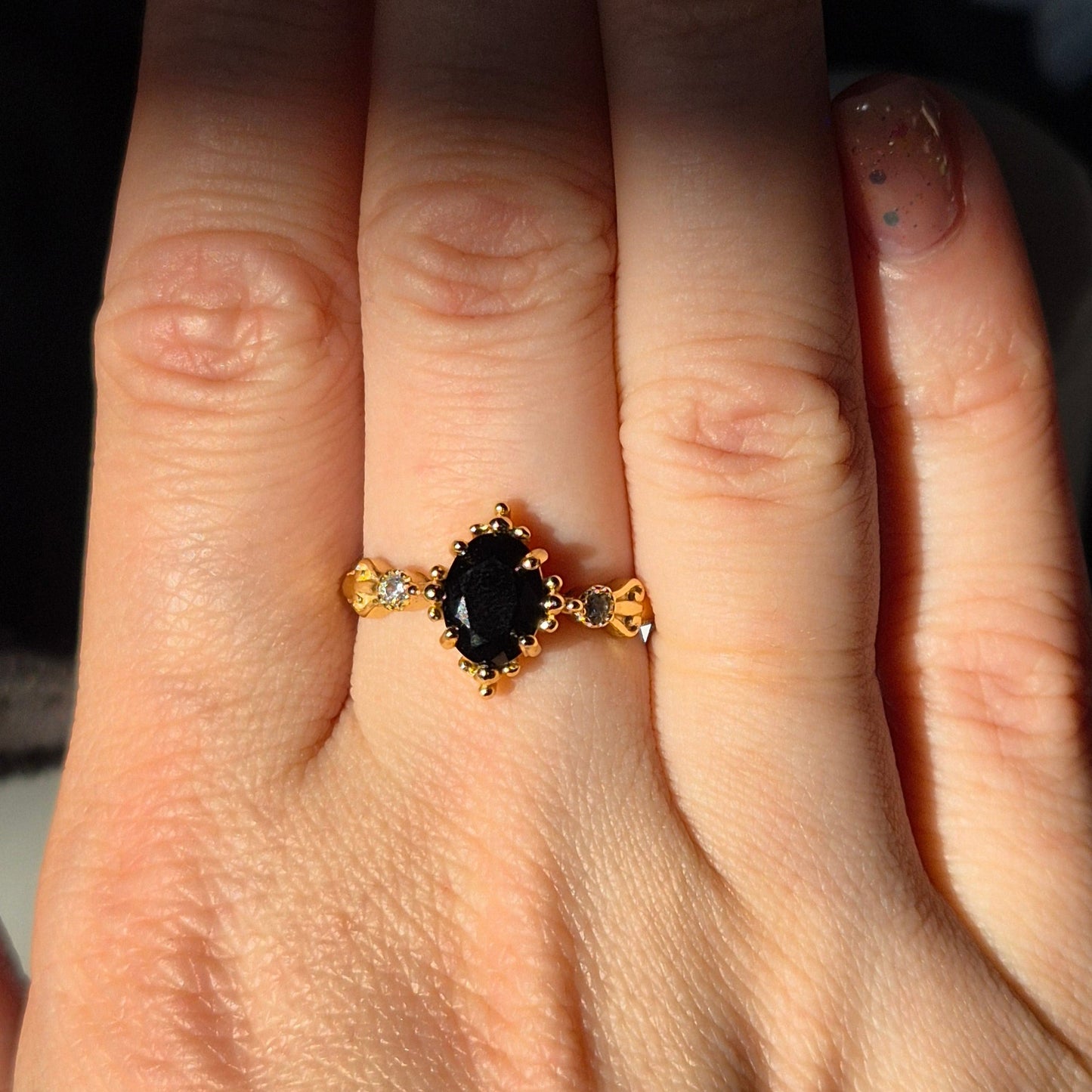 Black spinel ring "Fems" goldplated