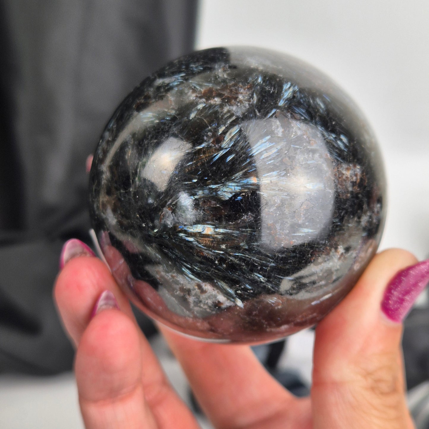 Garnet in arfvredsonite sphere