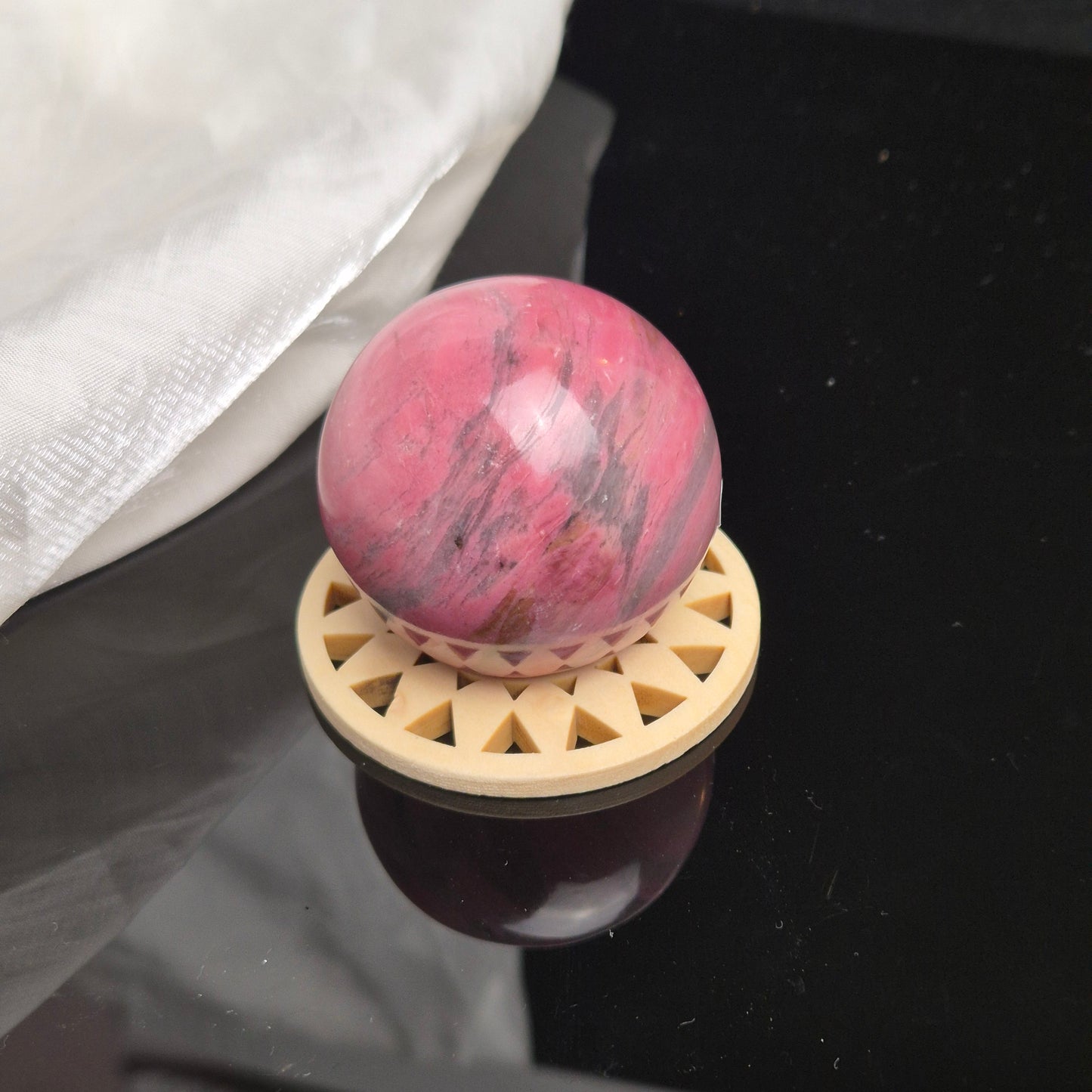 Bubblegum pink rhodonite sphere 2 (Peru)