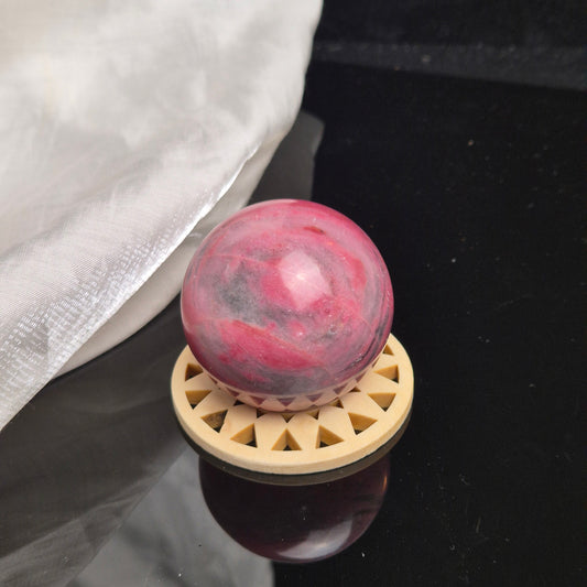 Bubblegum pink rhodonite sphere 3 (peru)
