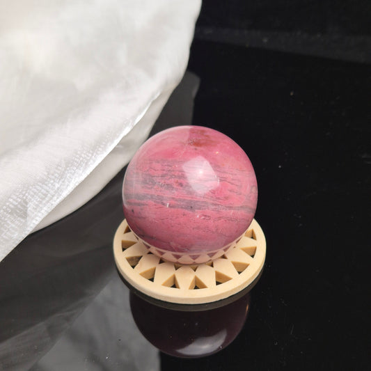 Bubblegum pink rhodonite sphere 5 (Peru)