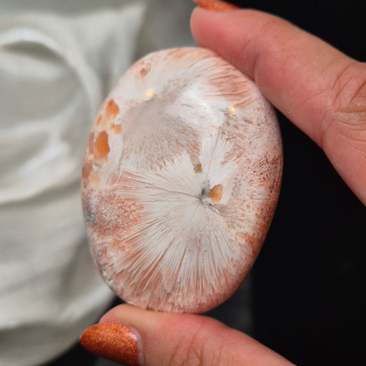 Pink scolecite palmstone 250