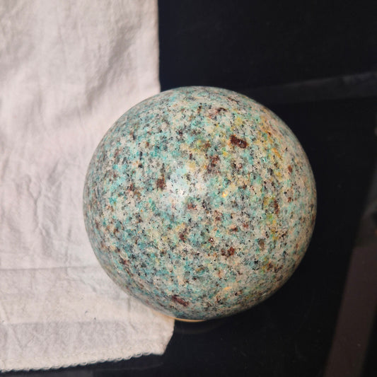 Amazonite / garnet sphere