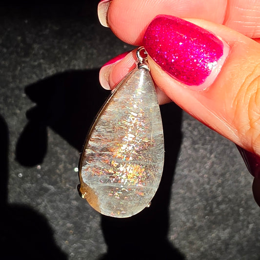 black moonstone /sun pendant