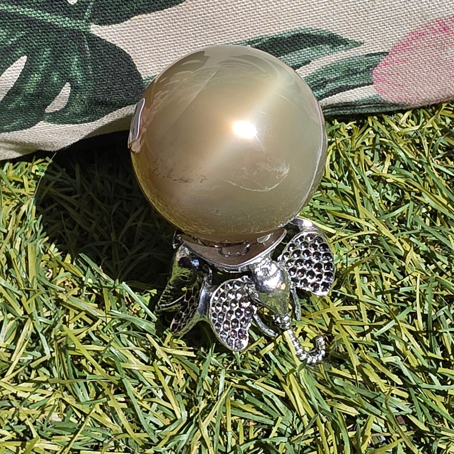 Tanzania green cate-eye moonstone sphere 11