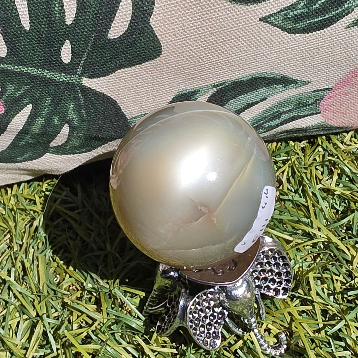 Tanzania green cate-eye moonstone sphere 11