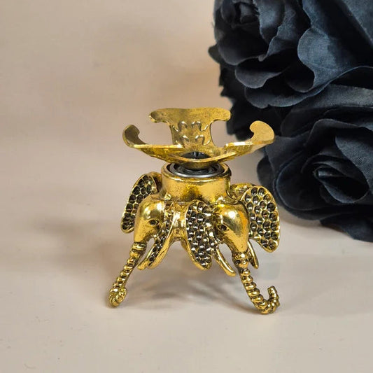 Spinning sphere stand elephant gold
