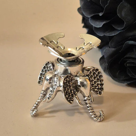 Spinning sphere stand elephant silver
