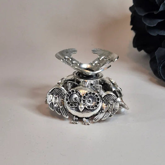Spinning sphere stand owl silver