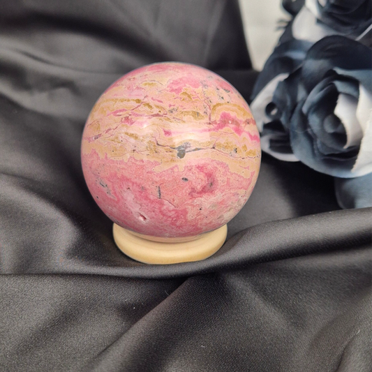 Pink Peruvian rhodonite sphere 1