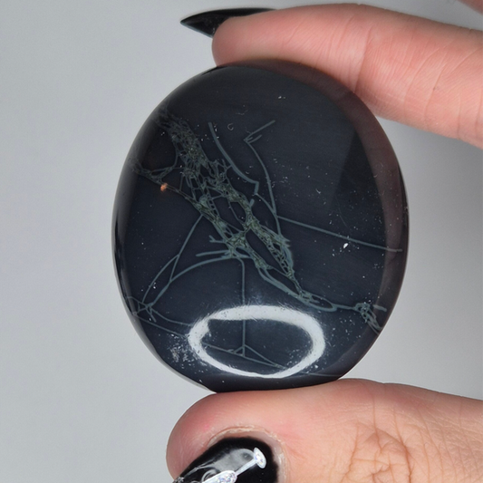 Spiderweb obsidian palmstone 15