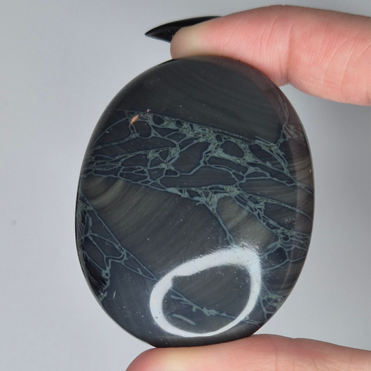 Spiderweb obsidian palmstone 17
