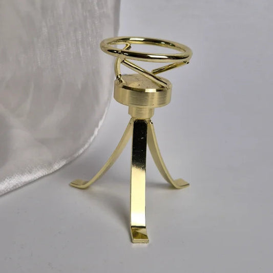Spinning sphere stand gold