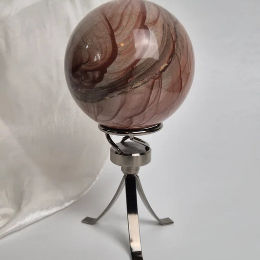 Spinning sphere stand silver